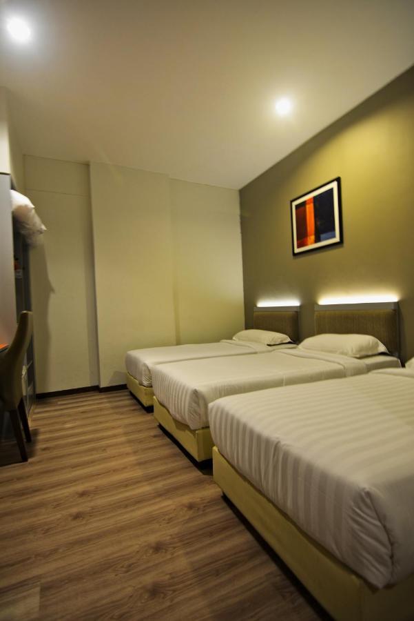 Abell Hotel Kuching Bagian luar foto